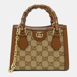 Gucci: Коричневая сумка 