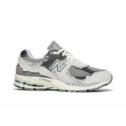 New Balance: Серые кроссовки 
