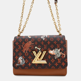 Louis Vuitton: Оранжевая сумка  Twist