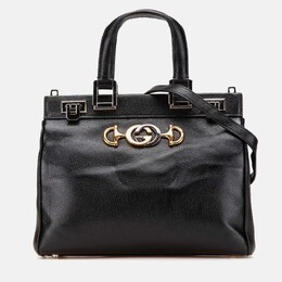 Gucci: Чёрная сумка на руку  Zumi