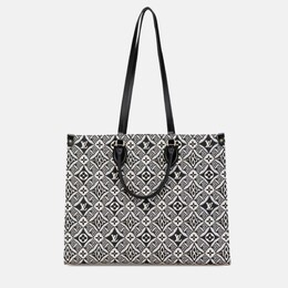 Louis Vuitton: Чёрная сумка-шоппер 