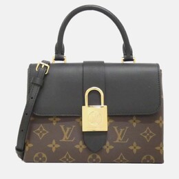 Louis Vuitton: Коричневая сумка 