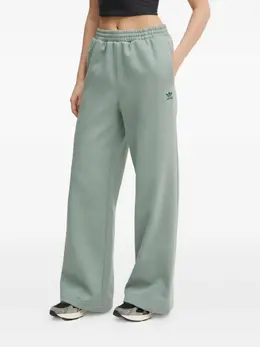 adidas: Зелёные брюки 