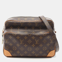 Louis Vuitton: Коричневая сумка 