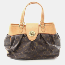 Louis Vuitton: Коричневая сумка 