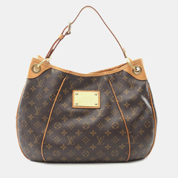 Louis Vuitton: Коричневая сумка 