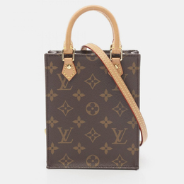 Louis Vuitton: Коричневая сумка 