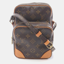 Louis Vuitton: Коричневая сумка 
