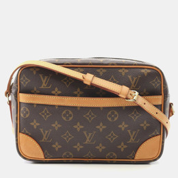 Louis Vuitton: Коричневая сумка 