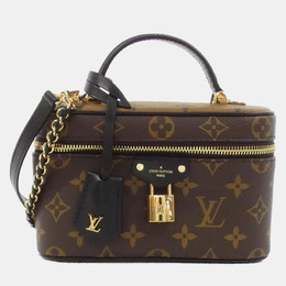 Louis Vuitton: Коричневая сумка 