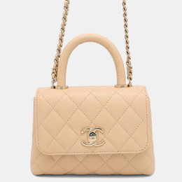 Chanel: Бежевая сумка на руку 