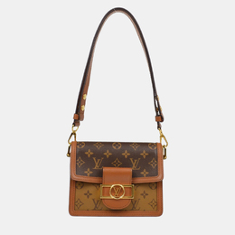 Louis Vuitton: Коричневая сумка 