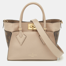 Louis Vuitton: Бежевая сумка 