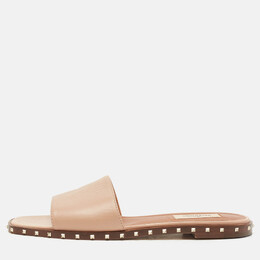 Valentino: Бежевые сандалии  Rockstud
