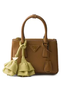 Prada: Коричневая сумка 