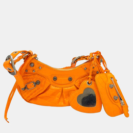 Balenciaga: Оранжевая сумка через плечо  Le Cagole
