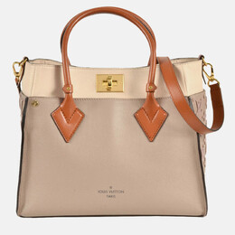 Louis Vuitton: Бежевая сумка 