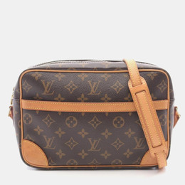 Louis Vuitton: Коричневая сумка 