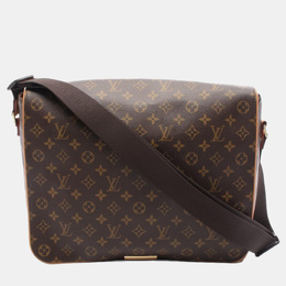 Louis Vuitton: Коричневая сумка 
