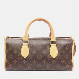 Louis Vuitton: Коричневая сумка 