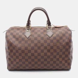 Louis Vuitton: Коричневая сумка на руку  Speedy
