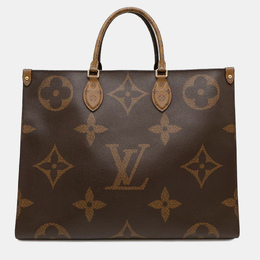 Louis Vuitton: Красная сумка-шоппер 