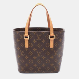 Louis Vuitton: Коричневая сумка 