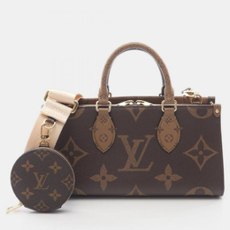 Louis Vuitton: Коричневая сумка-шоппер 
