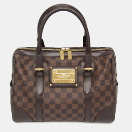 Louis Vuitton: Коричневая сумка 