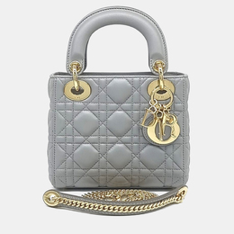 Dior: Серебристая сумка 