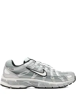 Nike: Серебристые кроссовки 