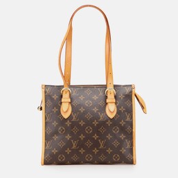 Louis Vuitton: Коричневая сумка 