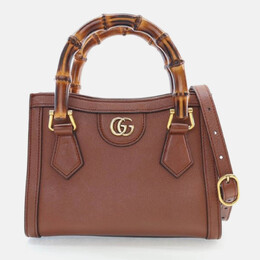 Gucci: Коричневая сумка-шоппер 
