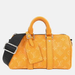Louis Vuitton: Жёлтая сумка  Keepall