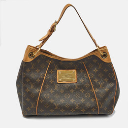 Louis Vuitton: Коричневая сумка 