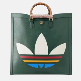 Gucci: Зелёная сумка 