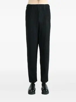 Homme Plissé Issey Miyake: Чёрные брюки 
