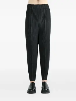 Homme Plissé Issey Miyake: Серые брюки 