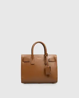 Saint Laurent: Коричневі сумки 
