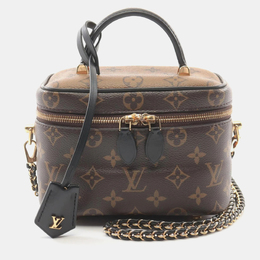 Louis Vuitton: Коричневая сумка 