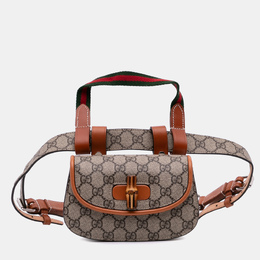 Gucci: Коричневая поясная сумка  GG Supreme