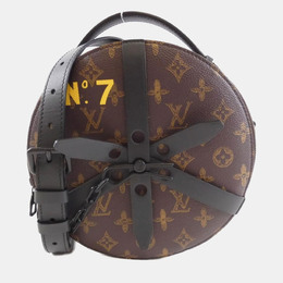Louis Vuitton: Коричневая сумка 