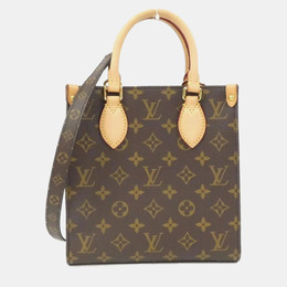Louis Vuitton: Коричневая сумка 