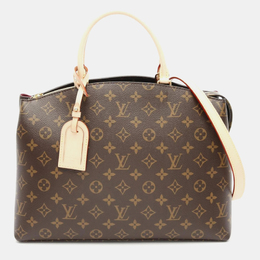 Louis Vuitton: Коричневая сумка 