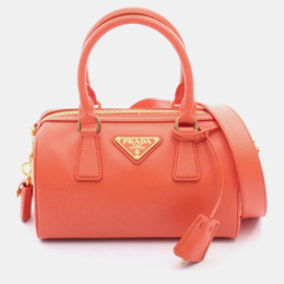 Prada: Оранжевая сумка 