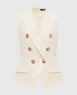 Balmain: Бежеві жилети 