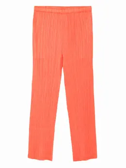 Pleats Please Issey Miyake: Оранжевые брюки 