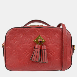 Louis Vuitton: Красная сумка через плечо 