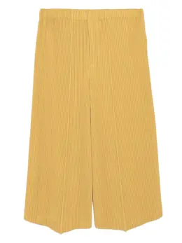 Homme Plissé Issey Miyake: Жёлтые брюки 