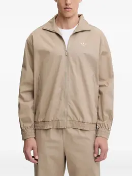 adidas: Бежевая куртка 